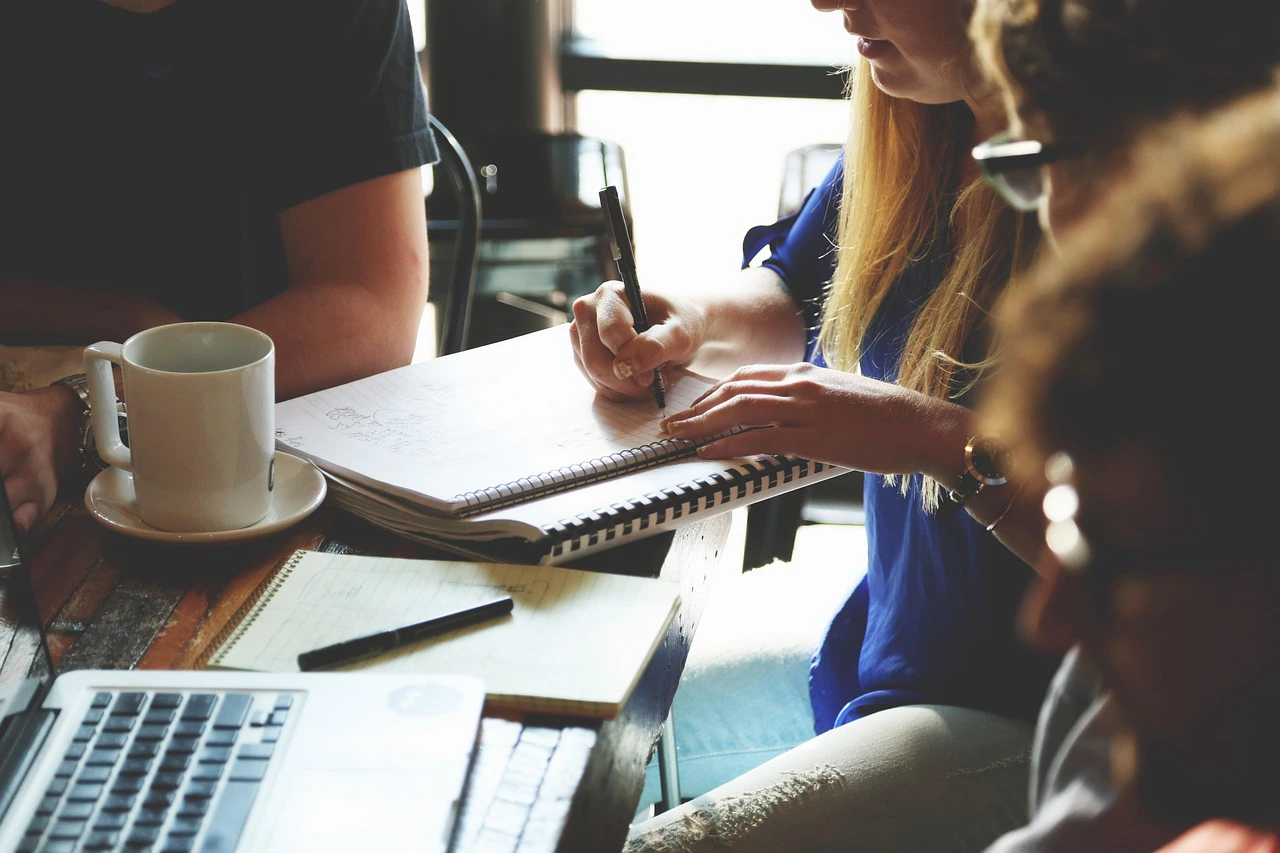 Business branding and brand identity materials on a desk, illustrating trademark protection