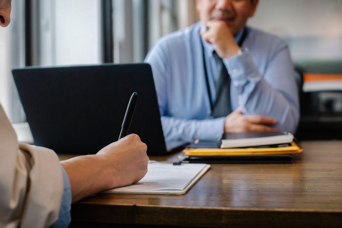 A lawyer reviewing documents at a desk