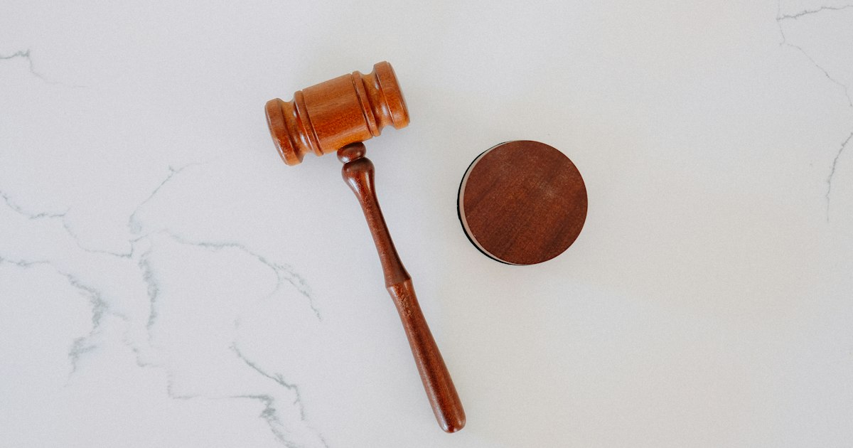 A judge's gavel resting on legal documents, representing debt recovery and enforcement in Lebanon
